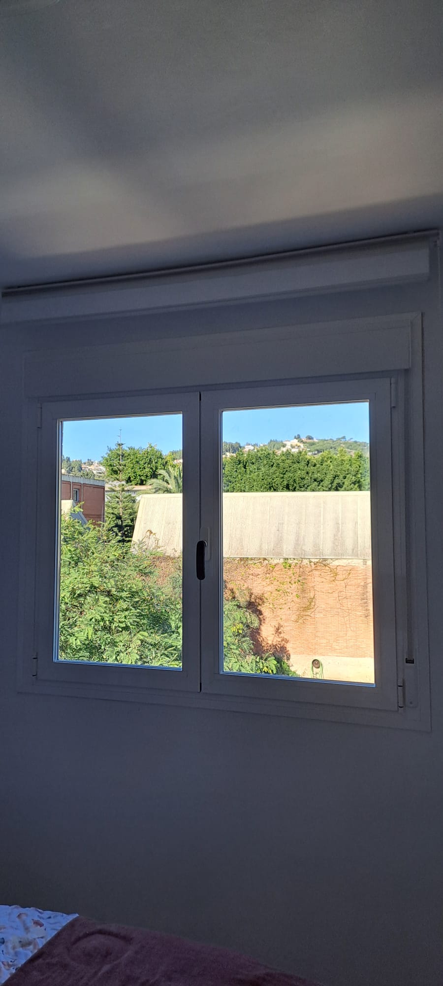 Ventana abatible, oscilobatiente, climalit y persiana